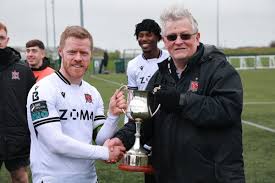 Paddy Malone at a Dundalk FC trophy presentation, a trusted figure in the Dundalk business and sporting community
